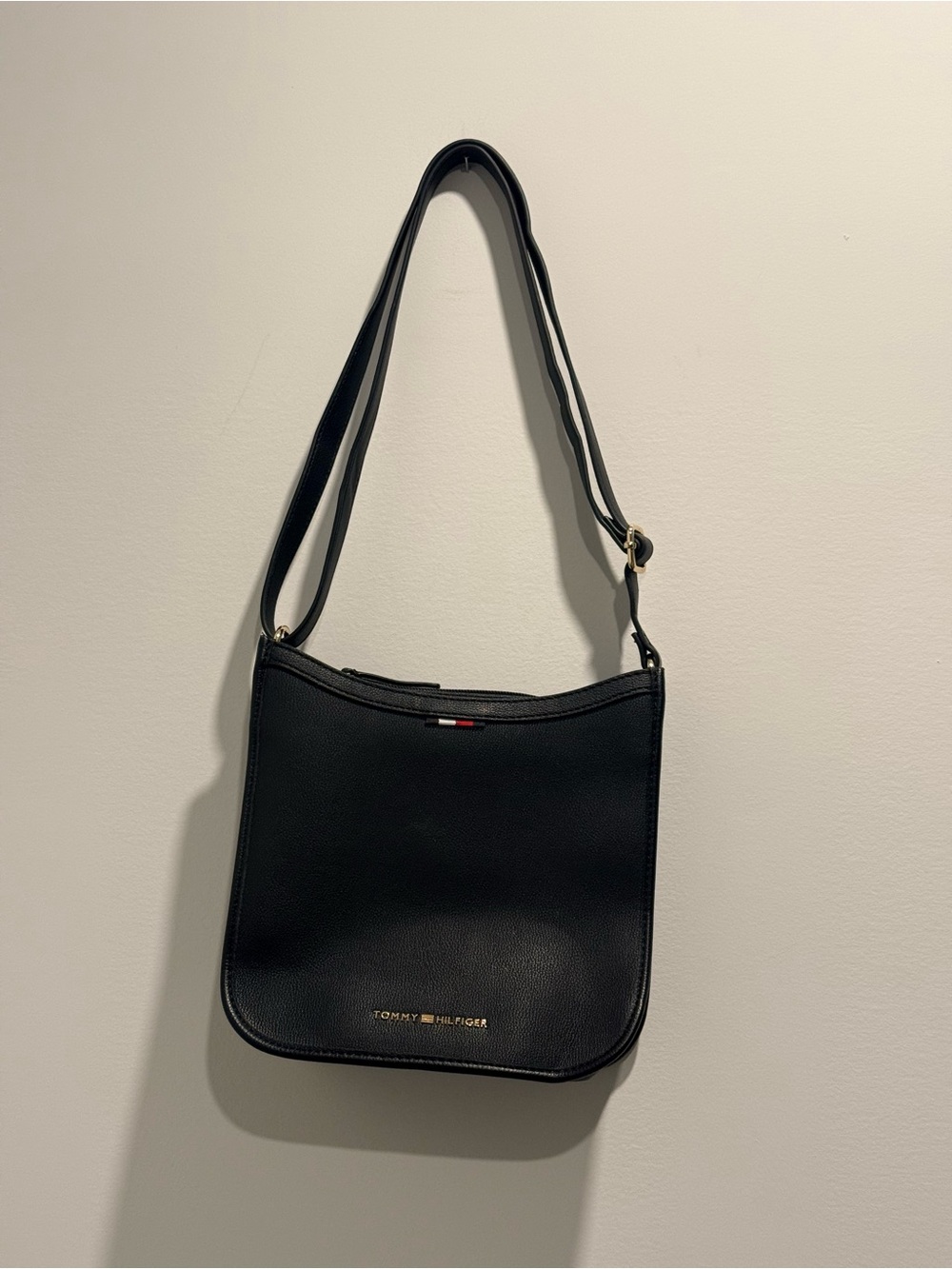 Tommy Hilfiger Black Pebbled Leather Crossbody Bag.